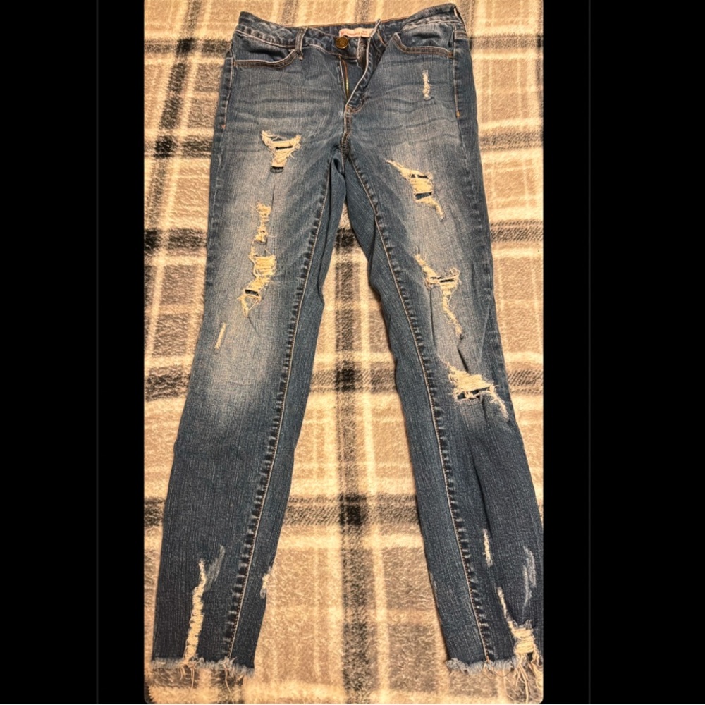 Distressed Blue Denim Jeans